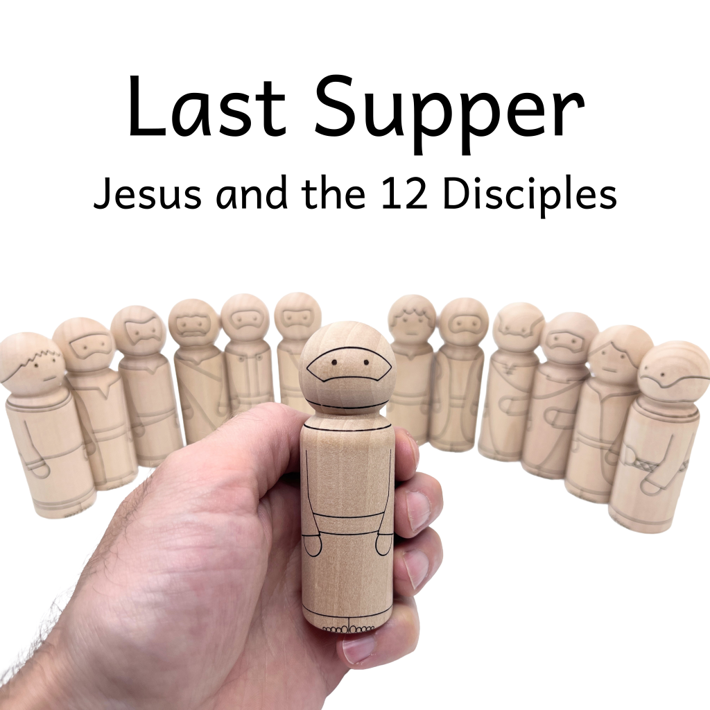 Hand holding wooden peg doll of Jesus in front of 12 disciple peg dolls